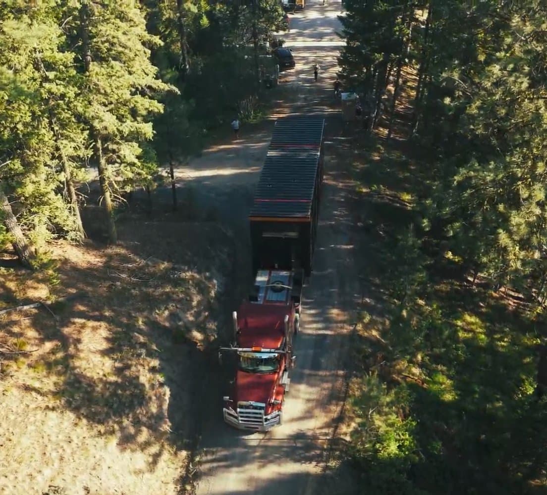 Montera Homes factory build — insulation installation in wall cavities