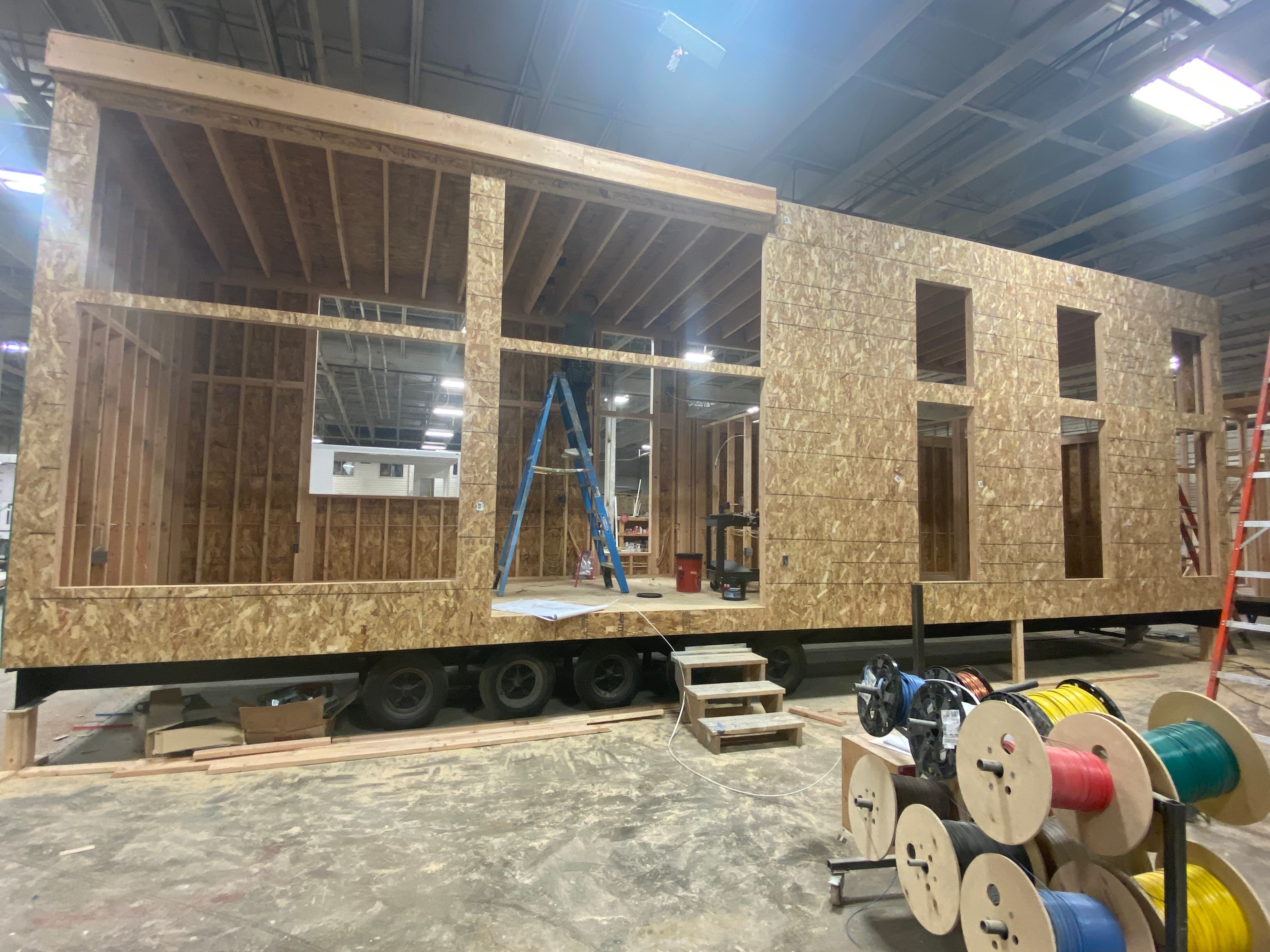 Montera Homes factory build — cabinetry and countertop installation