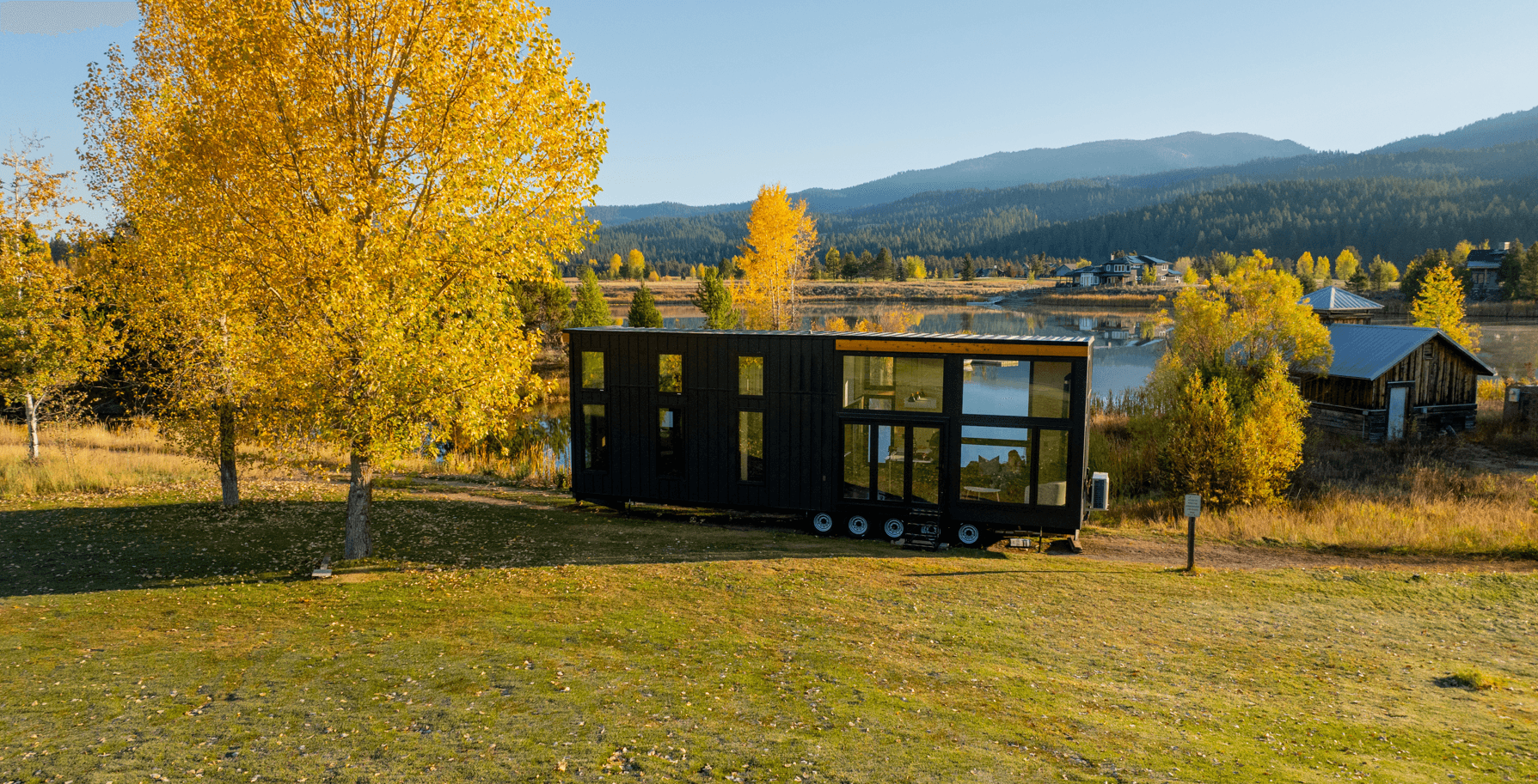 Montera Homes exterior rendering — steel and cedar luxury finish option