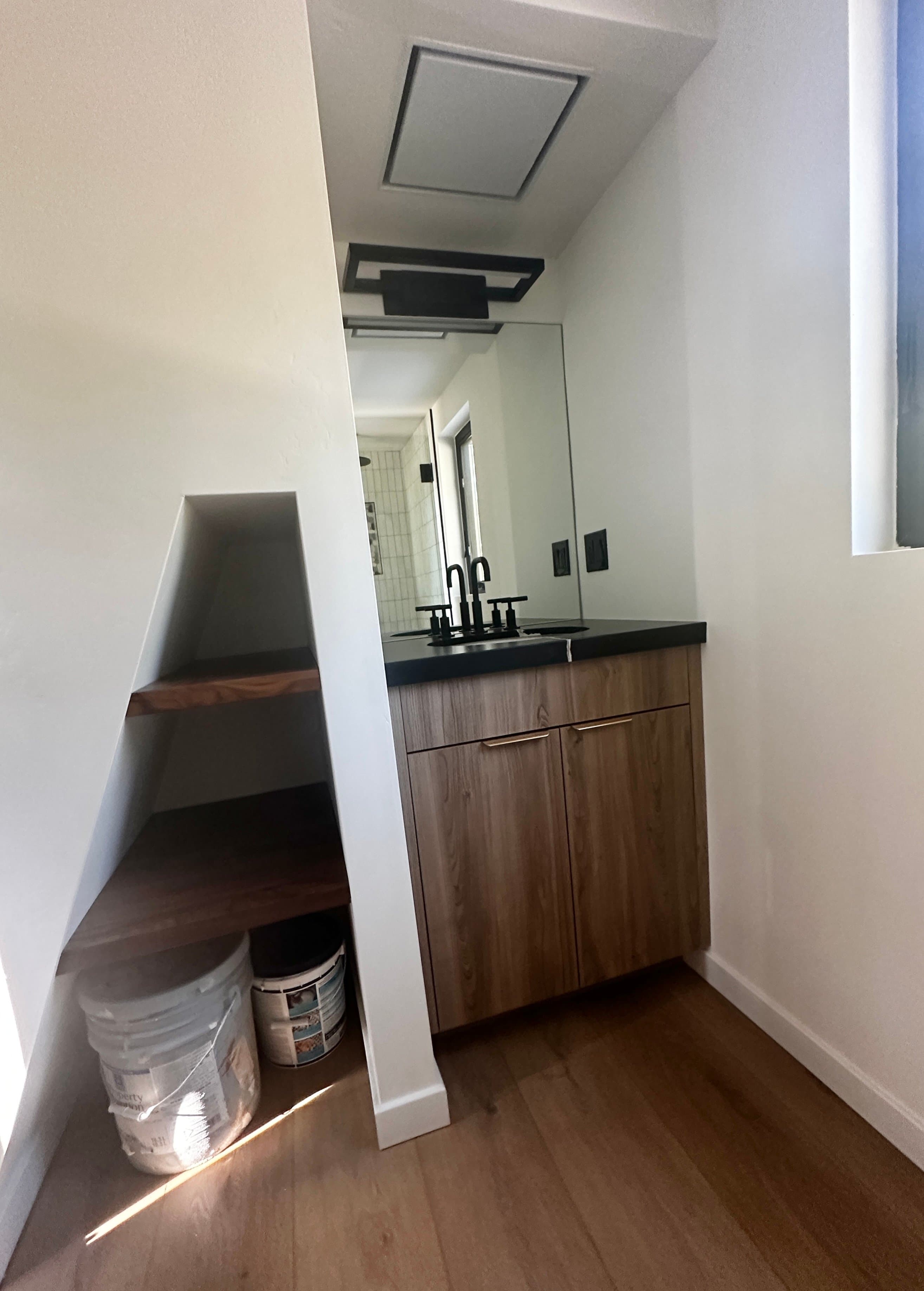 Montera Homes interior — full kitchen with custom wood cabinets and countertops