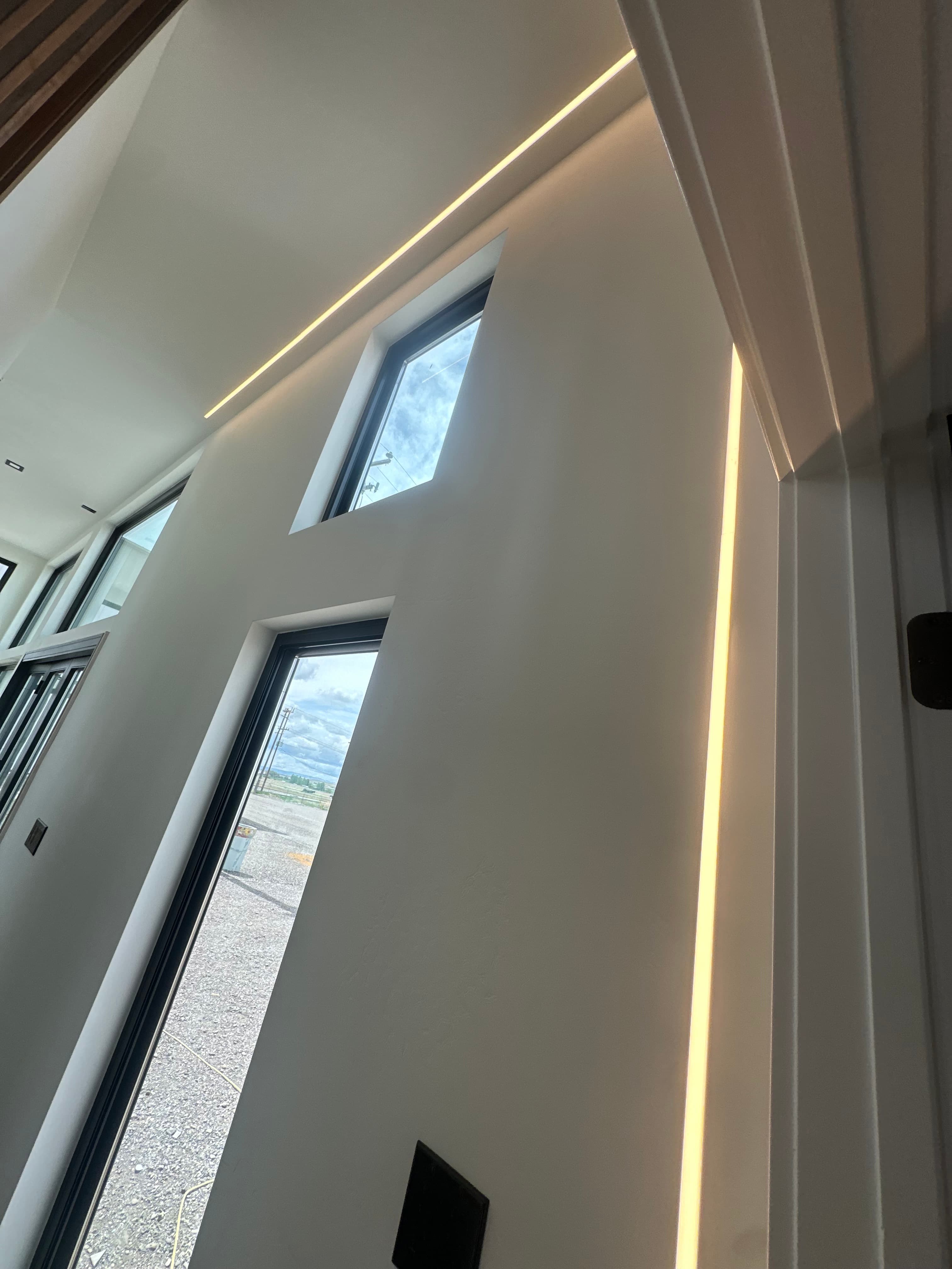 Montera Homes interior — living area with mini split heating and cooling unit